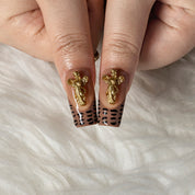 Bronze Relic Charm SQME0011 press-on nails hand model scene view 3