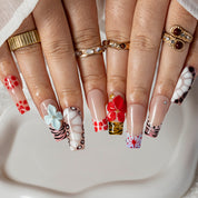 Scarlet Safari Blossom SQME0033 press-on nails hand model scene view 2