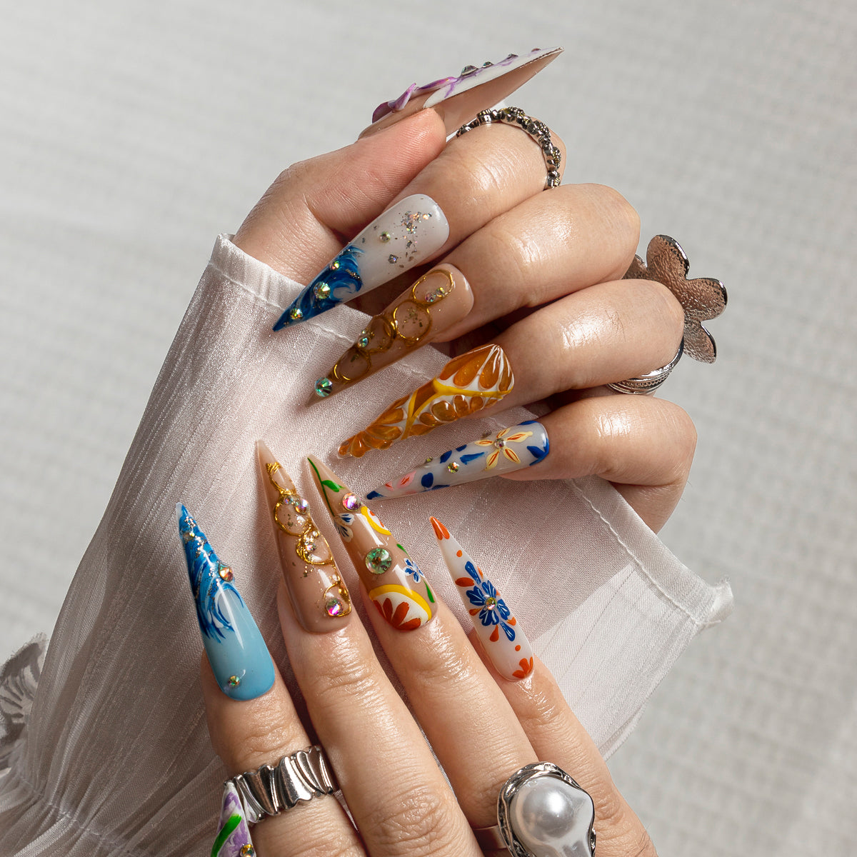 Painted Bloom STLO0001 press-on nails hand model scene view 1