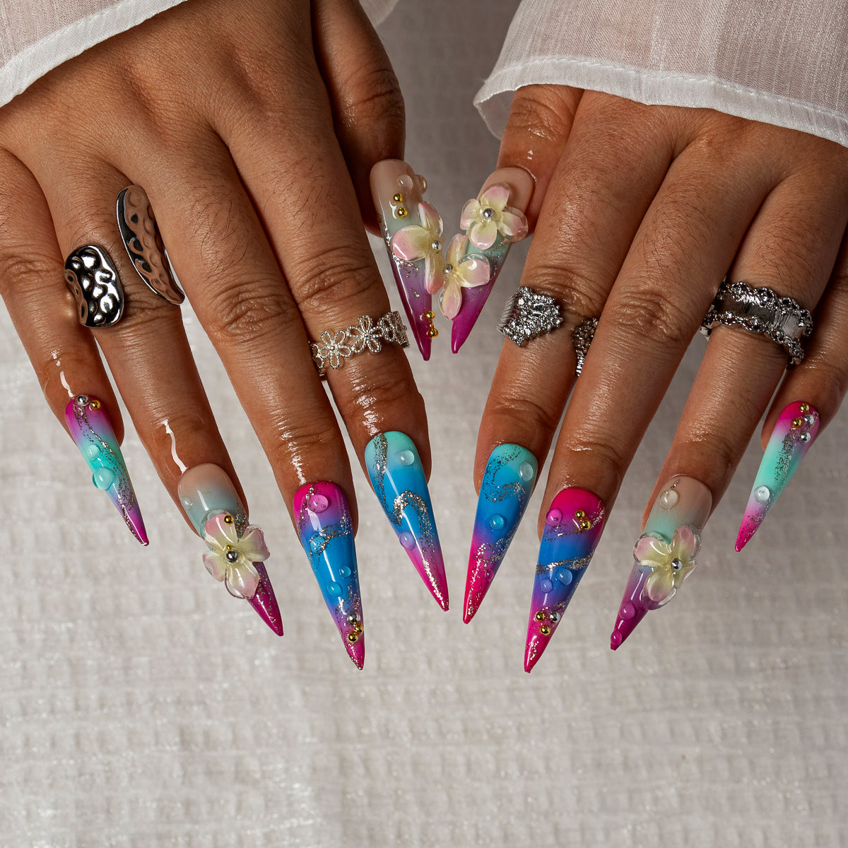 Aurora Blossom STLO0011 press-on nails hand model scene view 2