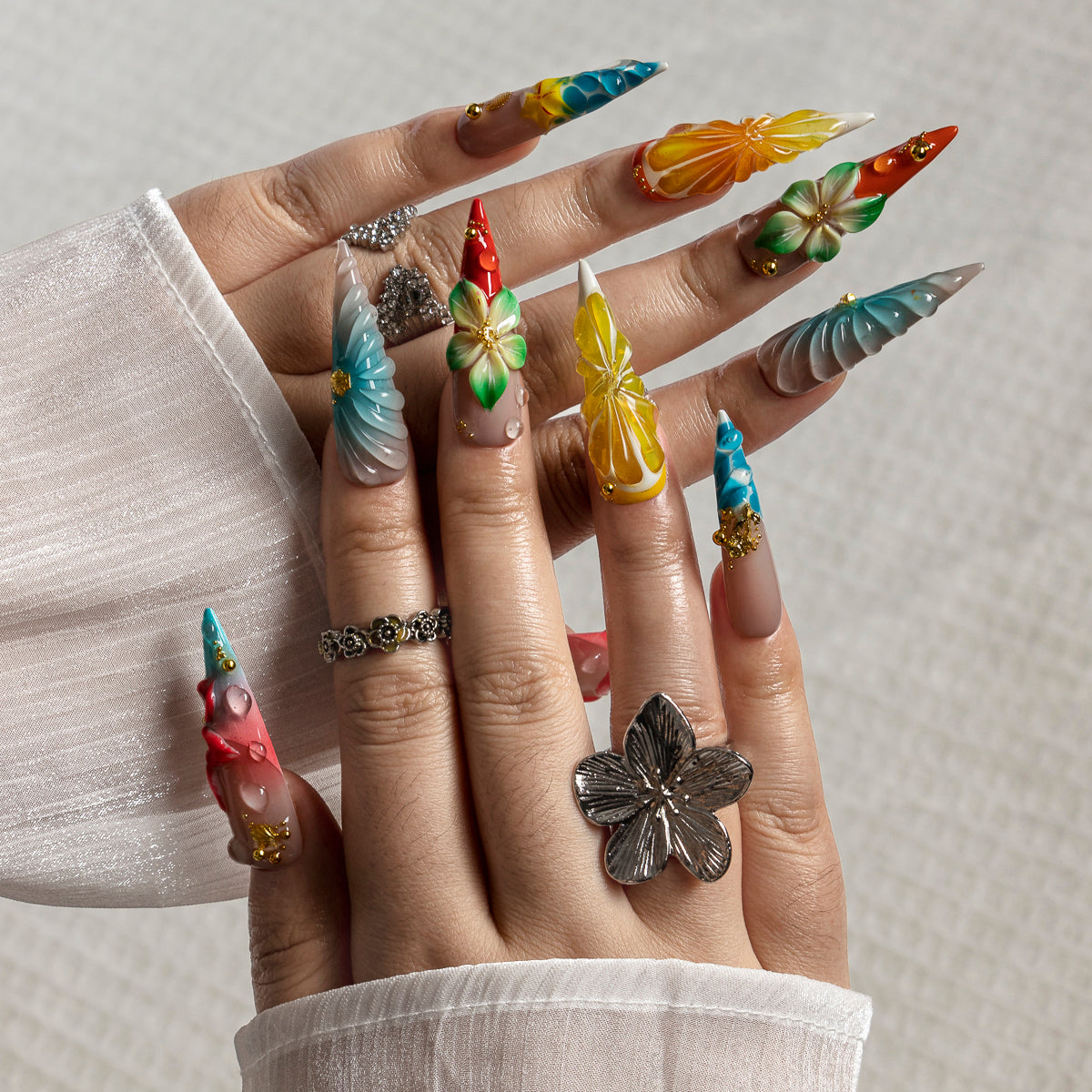 Island Petal Mix STLO0016 press-on nails hand model scene view 1