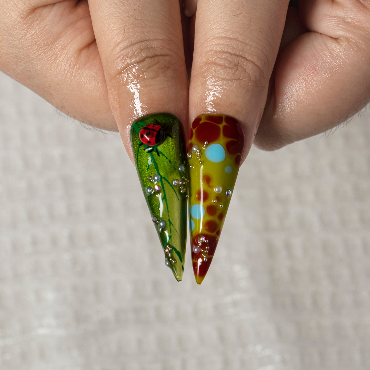 Ladybug Eden STLO0022 press-on nails hand model scene view 3