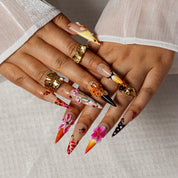Ladybug Hibiscus STLO0032 press-on nails hand model scene view 2