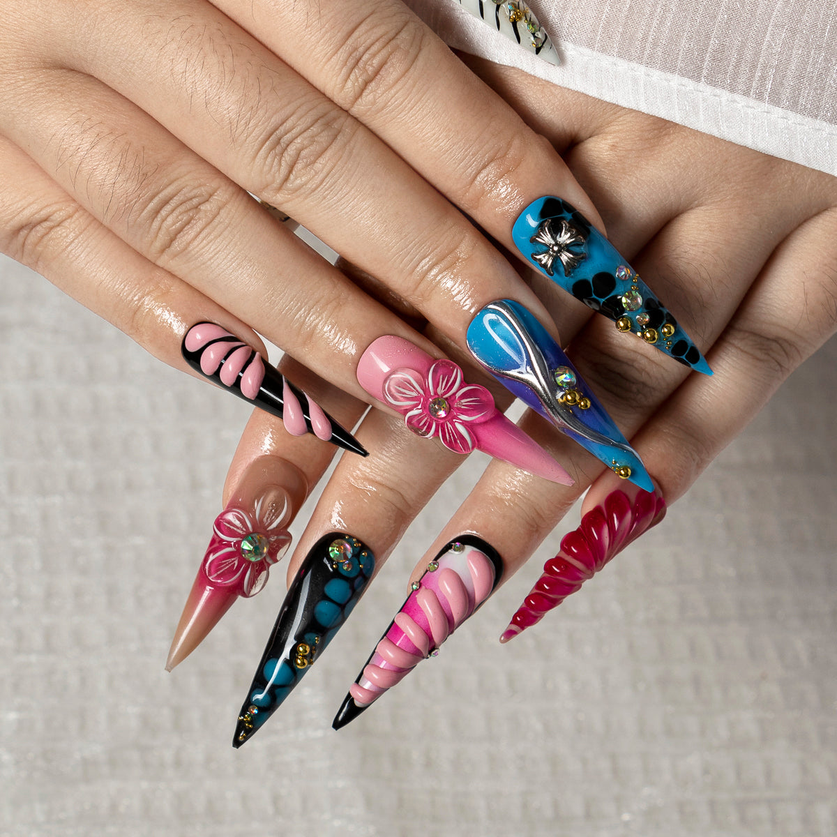 Cosmic Cross Bloom STLO0046 press-on nails hand model scene view 3