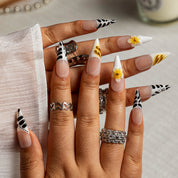 Daisy Zebra French STME0010 press-on nails hand model scene view 1