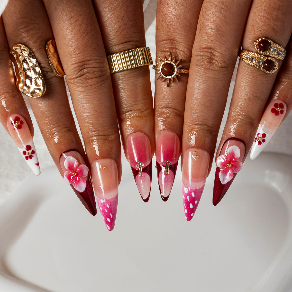 Fuchsia Cross Blossom STME0019 press-on nails hand model scene view 2
