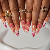 Rosy Zebra Bloom STME0021 press-on nails hand model scene view 2