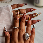 Bronze Butterfly Safari STME0029 press-on nails hand model scene view 1