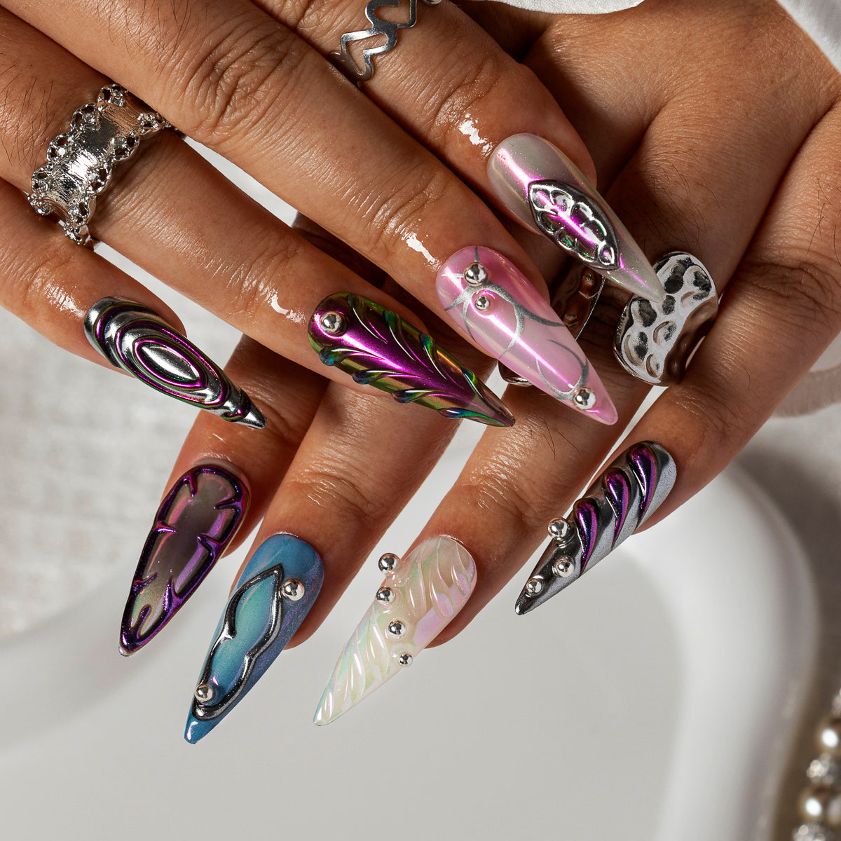 Neon Chrome Galaxy STME0032 press-on nails hand model scene view 3