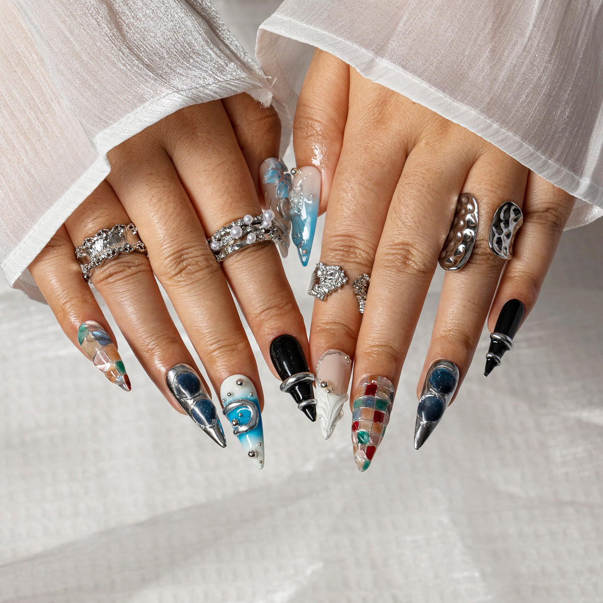 Arctic Blue Orbit STME0047 press-on nails hand model scene view 1