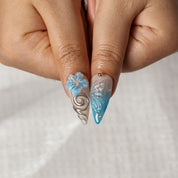Arctic Blue Orbit STME0047 press-on nails hand model scene view 3