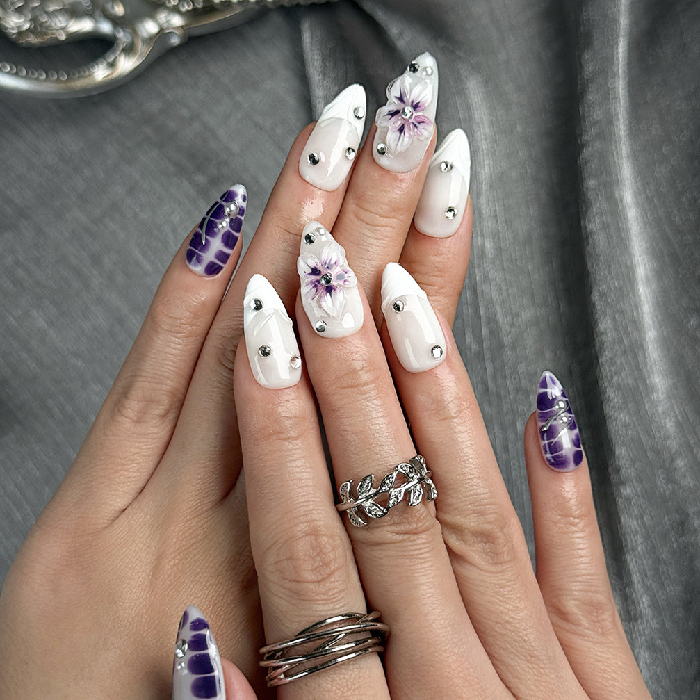 white flower nails medium almond press-on nails in purple and white with simple floral accents summer holiday style
