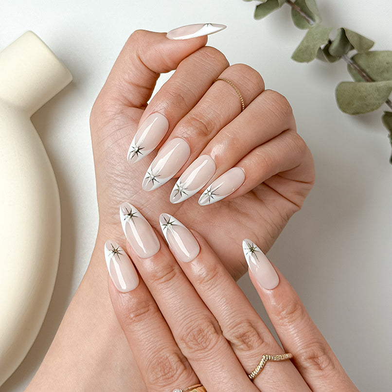 white sparkly nails medium almond nude press-on nails with simple nail art for summer wedding